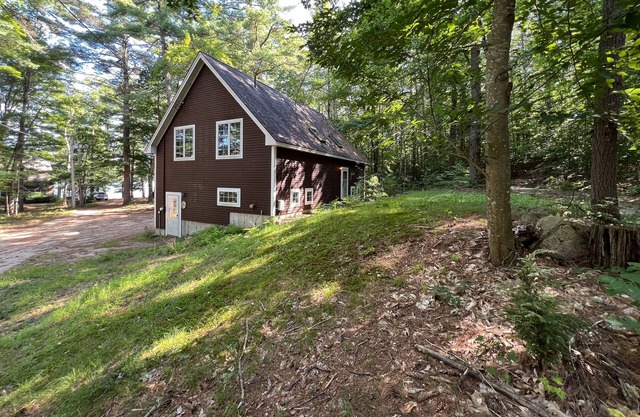 Tranquil Lakefront Retreat with Private Beach and Spacious Living