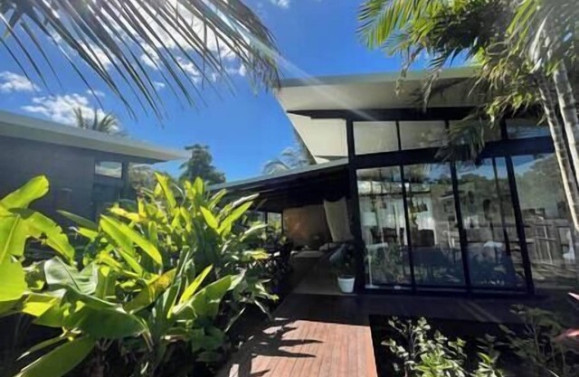 Tropical Modernist Retreat is set up as a contemporary beach abode