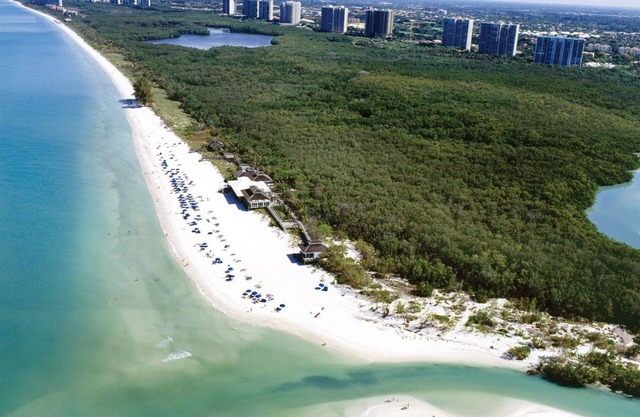 Tropical Paradise Vacation at Valencia in Pelican Bay. BOOK NOW FOR 10% DISCOUNT