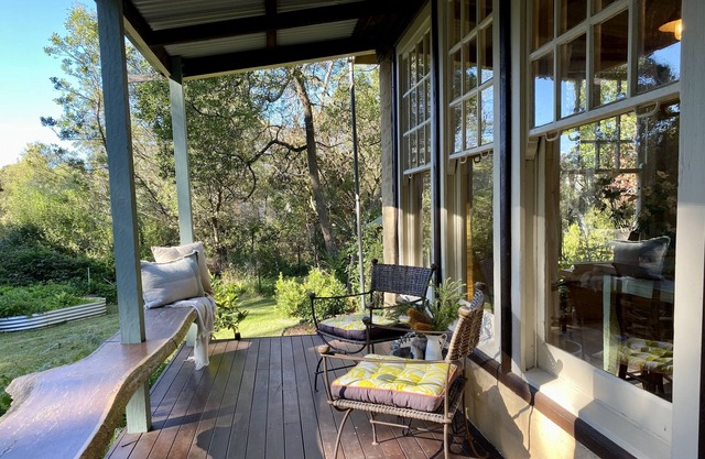 Unique Mud-Brick Cottage, bush garden with a flowing creek