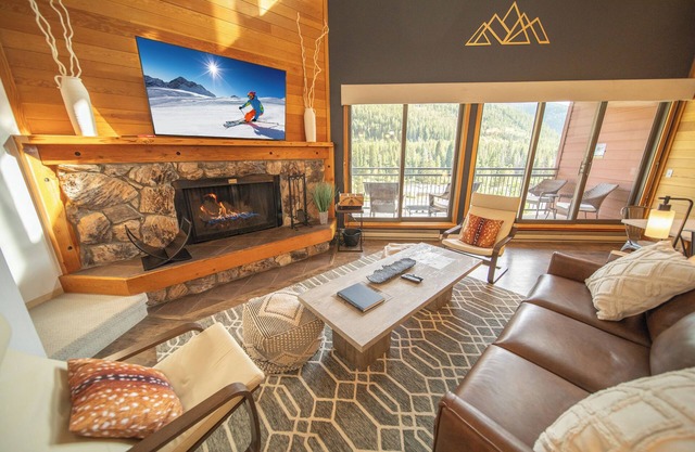 Unit with wood burning fireplace and free shuttle