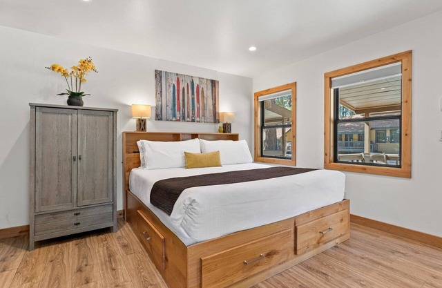 Updated and Sleek End Unit Condo with Privacy and Perfection!