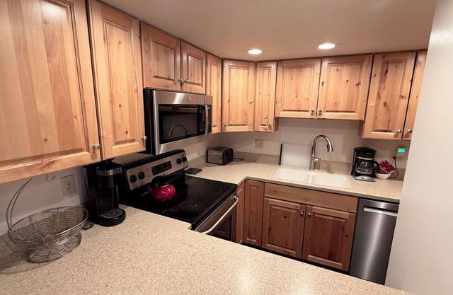 Updated Kitchen Cabinets in Vail Condo with In Unit Washer Dryer