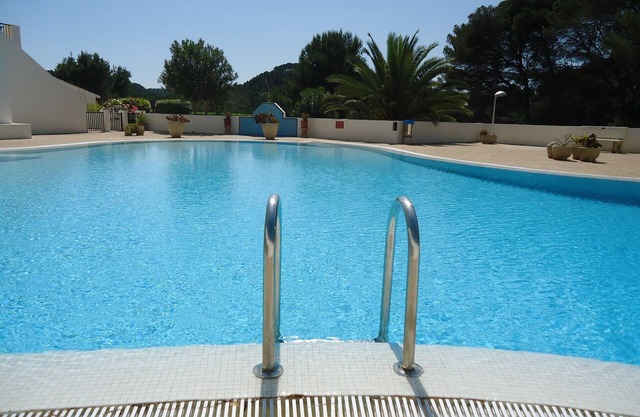 Upgraded, traditional-style apartment with balcony overlooking golf course.