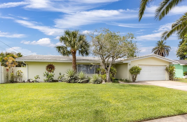 Vacation Rental Home -Near Beach, On a Canal with Pool - Great Location