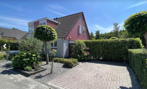 Vakantiehuis op Villapark Oesterbaai aan zee , met speeltuin grenzend aan de tuin