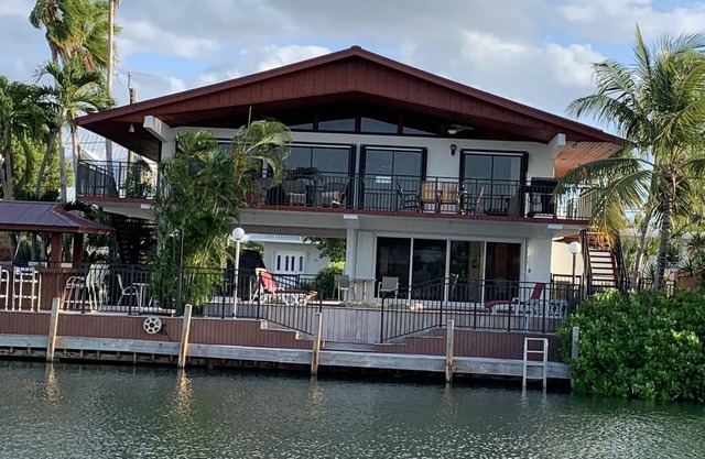 Venetian Shores Escape! Heated Pool, 3BR, 70ft Dock, Dog-Friendly!