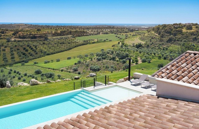 Villa Nivura, Minimalist Elegance Amid the Olive Groves