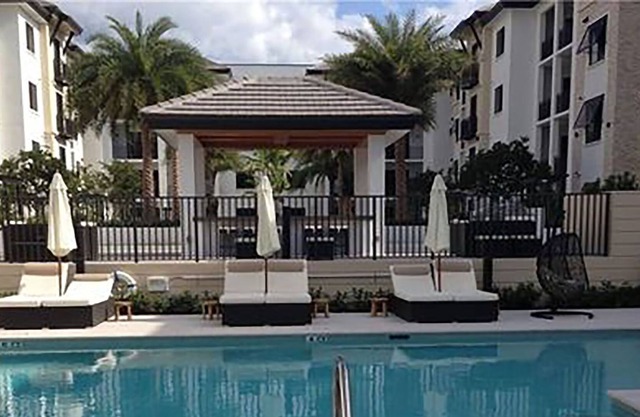 WALK TO SHOP & DINE, LARGE LANAI, SECURE, GARAGE PARKING… Annual also available