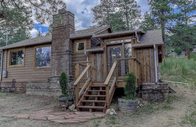 waterfall, sauna, fireplace, hammock, full kitchen
