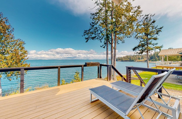 Waterfront dream home with unparalleled views, gas fireplace, & washer/dryer