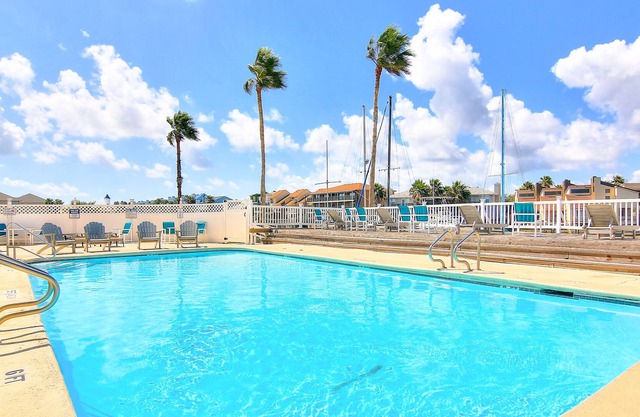 Waterfront getaway with pools, grills & fitness room