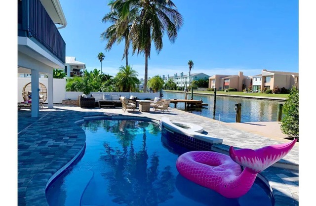 Waterfront Oasis, Heated Pool, Dock, Golf Cart & Chef’s Kitchen