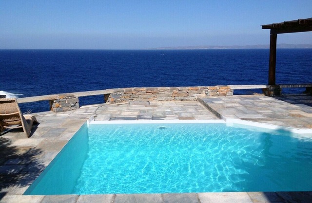 Waterfront Villa with private swimming pool-walking distance to a sandy cove.