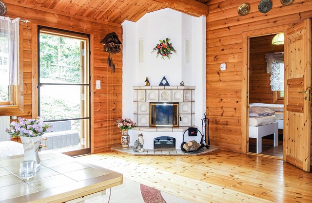 Welcome to this quietly located wooden house with terrace.