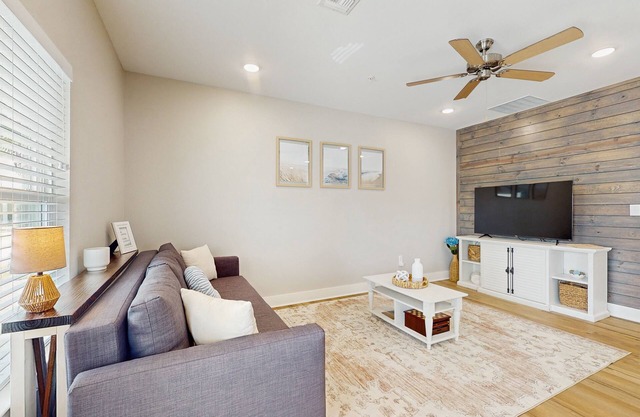 Welcoming coastal home with shared pool, stocked fishing pond - kitchen & patio