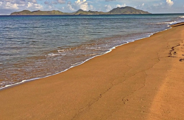Wonderful Rates - Part Ocean view villa with 2 bedrooms right on Pinney's Beach