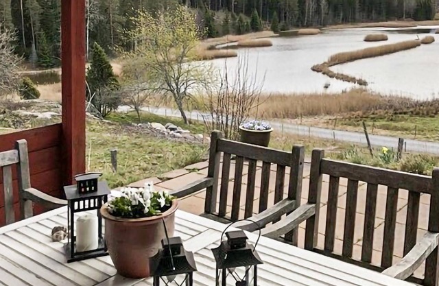 Wooden house full of character with magnificent view of the water.