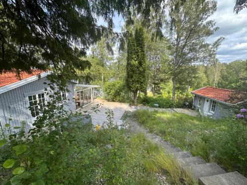 Nykvarn House | Åretrunt stuga med fiskebåt