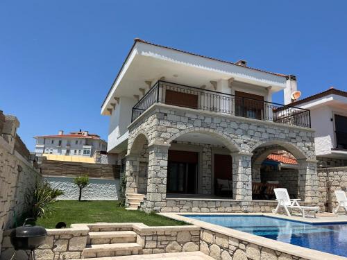 Sifne Mahallesi Villa | Çeşme Reisdere kiralik havuzlu villa