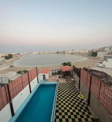 Dhahran Ski Chalet | شاليه موج البحري بمسبح وشاطئ خاص