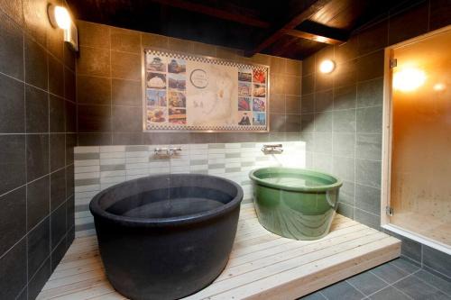 Nishinari Apartment | かまどと壺湯之宿 大阪ミナミ–Residence inn Kamado and Tsuboyu-