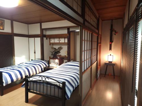 Yahatanishi House | ゲストハウス若水黒崎