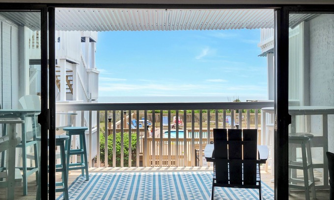 Wilmington Beach Condo | 10 steps away till sand in your toes on the ocean front in Carolina Beach, NC.