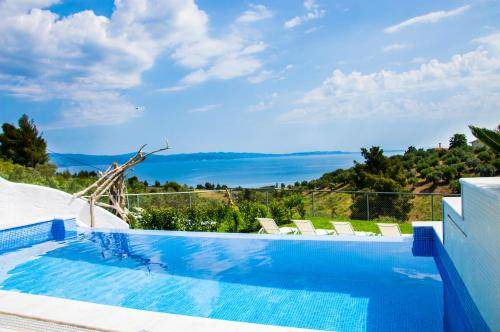 Agios Nikolaos Resort | 130 m² Resort ∙ 4 bedrooms ∙ 8 guests