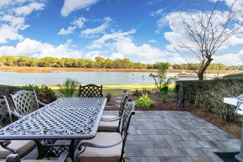 South Beach Villa | 1626 Port Villa - Stunning Sunrise Views Over Braddock Cove, with Open Living Area, Patio, Balcony