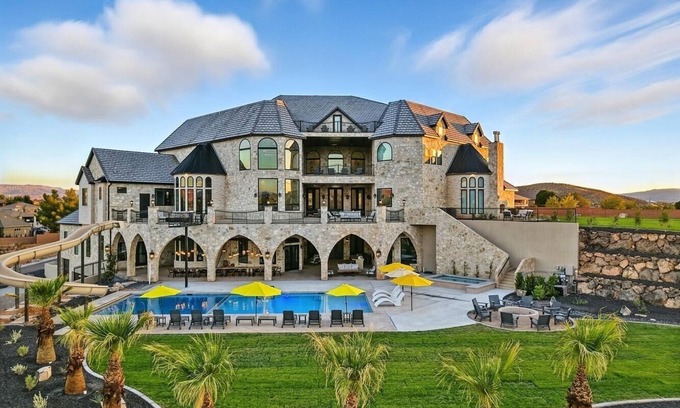 St. George Other | 16K sqft Castle! Sleeps 40. Theater. Rock-Climbing Wall. Gym. Pool. VIEWS!
