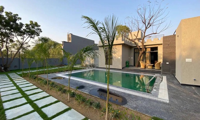 Durgapura Villa | 1983 garden with pool villa