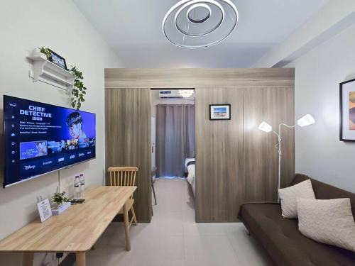 Highway Hills Apartment | 1BR Condotel with Balcony at FAME Residences #FM30