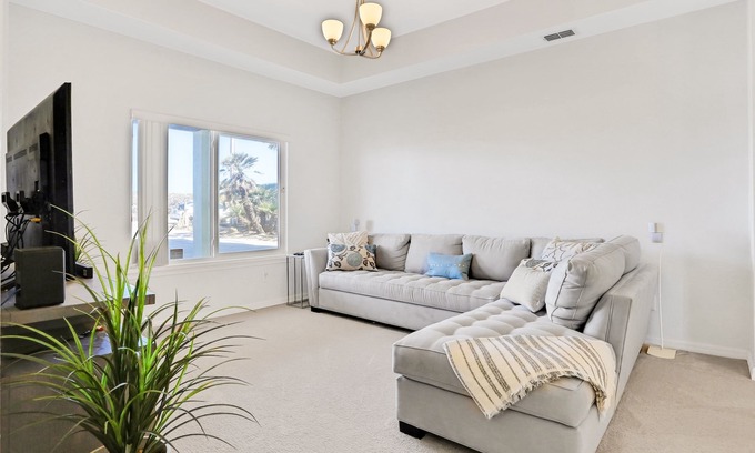 New Smyrna Beach House | 1st-floor beachfront home with outdoor shower, patio, grill, ocean & beach views