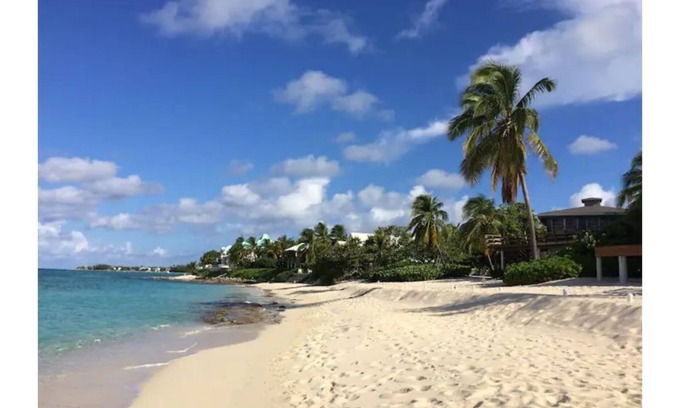 West Bay House | 2 bedroom condo with pool close to the beach