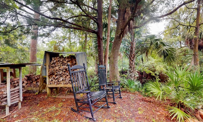 Bronson Cabin | 2 riverfront cabins with large yard, grill, firepit, canoe, & private W/D