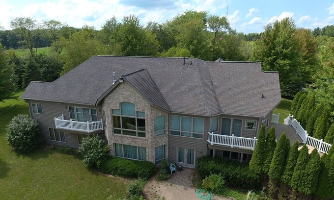 Marengo House | 20-acre Private Family Farmhouse with Event Barn, Private Fishing Pond, and Pool