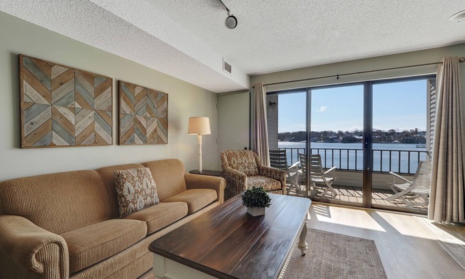 Charlevoix Condo | 227 Edgewater Inn | Private Lakefront Balcony Stay | Pool, Hot Tub, Sauna