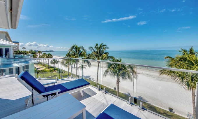 Mid Island House | 251 Key West Court: Luxurious Beachfront Home with Pool