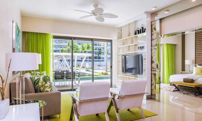 Playa Mujeres Apartment | 2br beachfront condo w/Private swim up pool
