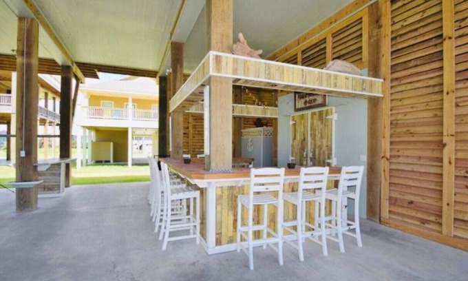 Crystal Beach House | 2nd row, Luxury, Ocean view, 360 porch- 4 bedrooms, 3 baths, and sleeps 21
