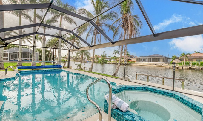 Pelican House | 3/2 updated Gulf access canal home electric heated pool & Jacuzzi - Coconut Cove