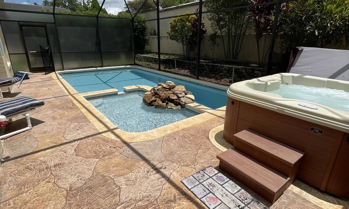 West Kissimmee House | 3 miles Disney, New Renovated 4 BR/3Ba Pool,Hot tub, Super Speed Wi-Fi,game room