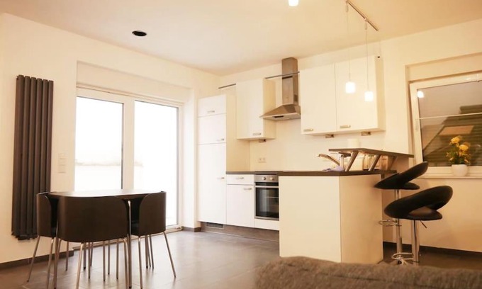 Gruenstadt Apartment | 3 ZKB Einliegerwohnung im Neubau (73m²) mit Ladesäule