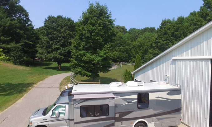 Cedar House | 30' motorhome on private setting.