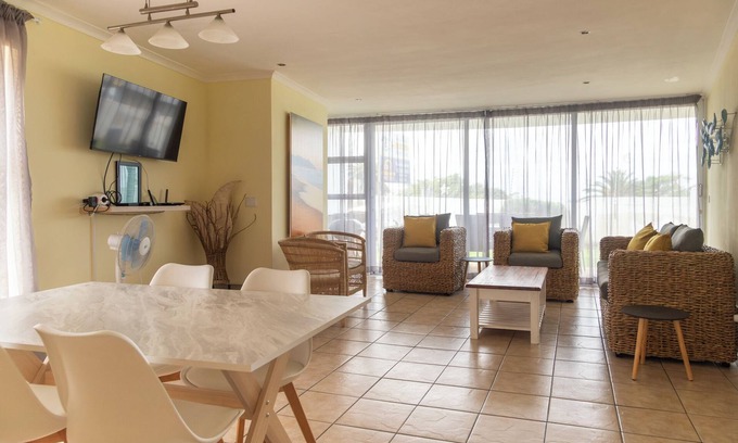 Jeffreys Bay Apartment | 350 metre from beach. 2-bedroom, 2-bathroom ground floor apt with patio & braai
