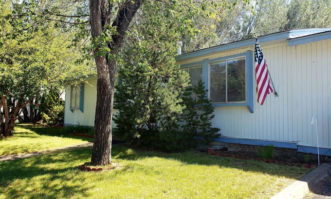 Rock Springs House | 4 Bed 2 Bath Home. Great area. Yard and sun porch. Close to Shopping and park.