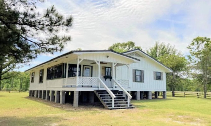 Saint Maurice House | 40 Acres 4 Bedroom 4 full bathroom Home with a Pond stocked with Fish & RV Port