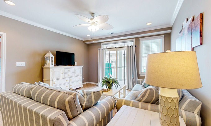 Sunset Island Condo | 4th-floor condo with out/indoor pools, gym, community beach, fast WiFi, W/D, AC