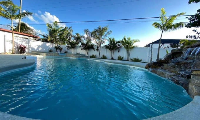 Port Canaveral House | 5 BR beach House, heated salt water pool, hot tub, King bed, & walk to the beach